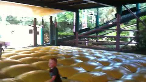 Jolie playing in bouncey area at Busch Gardens