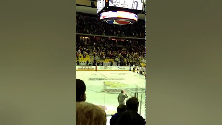 Ana Mattson singing National Anthem at UMD game 13...