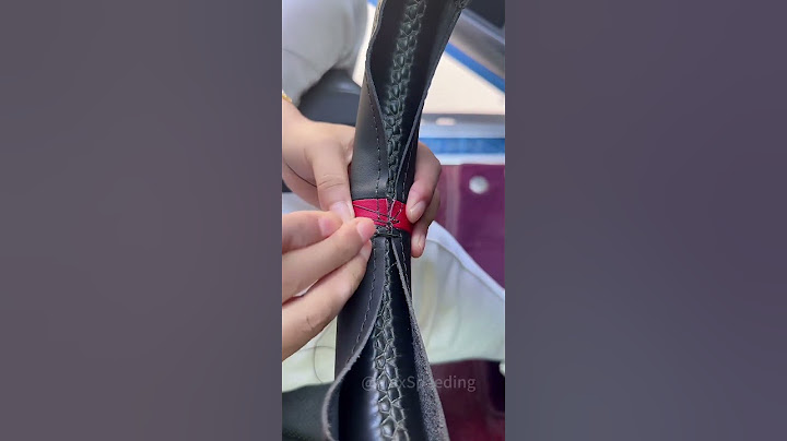 Stitch by stitch, bringing my steering wheel back to life. 🧵🚗 #automobile #car #interior #diy