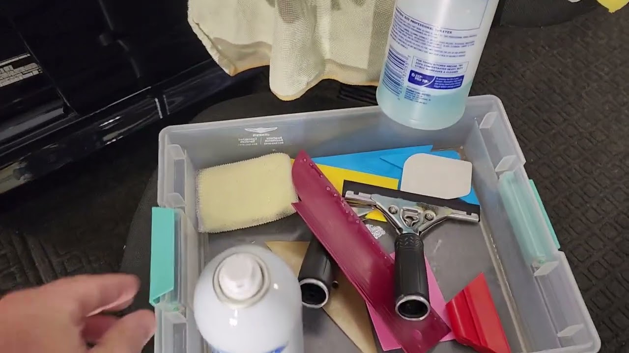 How to Tint the Windows on a BMW without getting debris, creases or light leaks at Tint Man FL Inc.