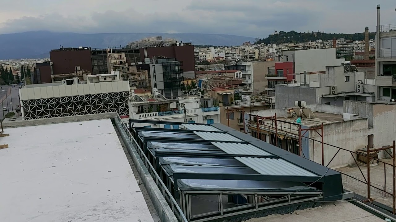 "Glazetech ALROLL" - Αίθριο με πτυσσόμενη σκίαση αλουμινίου. Skylight with sliding aluminum system.