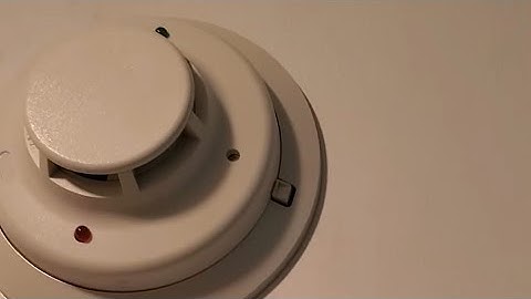 Testing a System Sensor I 3 smoke detector with a candle