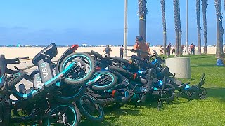E- Bikes thrown into Pile by Angry Cyclist for Blocking Beach Path