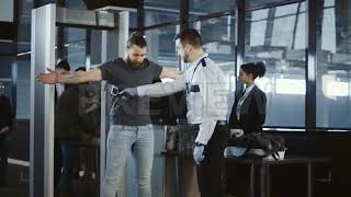 Airport security pat down frisk search on a man