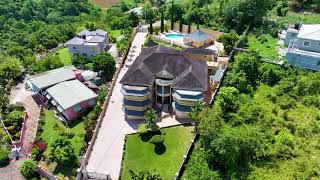 EXECUTIVE STYLE MANSION FOR SALE IN MANDEVILLE MANCHESTER | 7 BEDROOMS  WITH POOL AND GARDENS