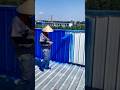 Professional Spray Painting Technique for Restoring and Protecting Metal Roof Panels #shorts