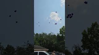 Releasing balloons at my sister's memorial