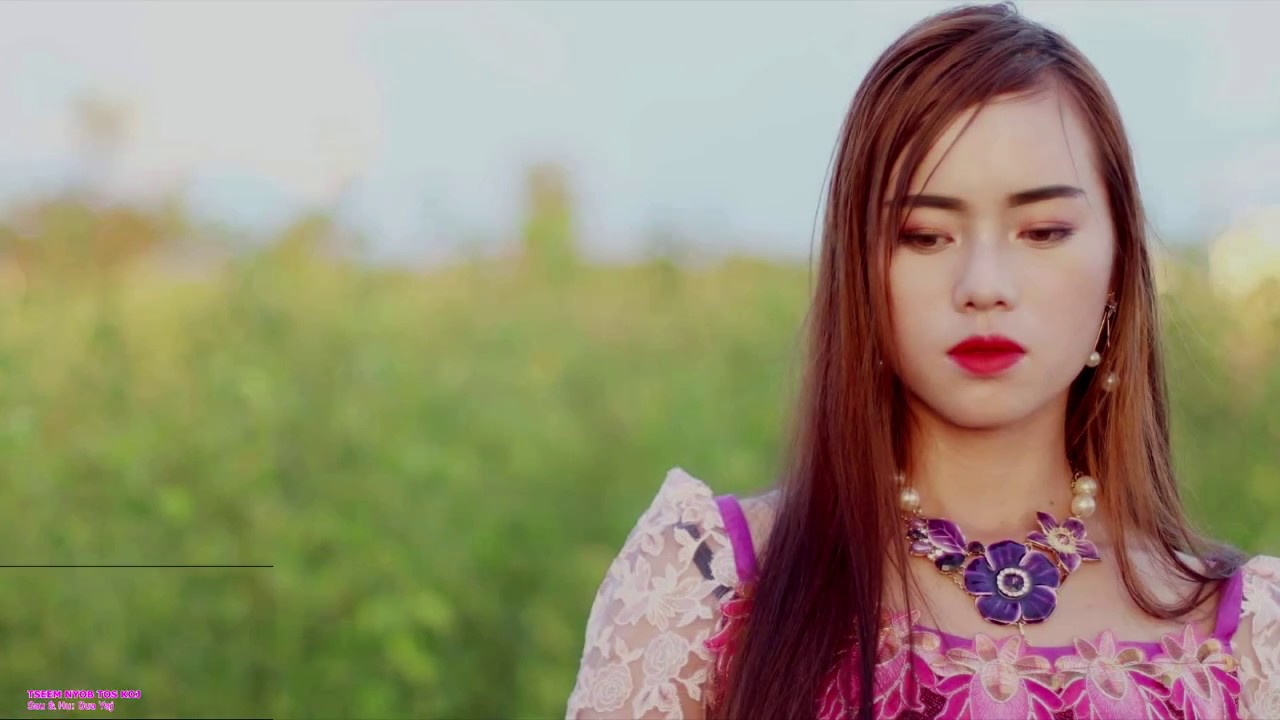 tseem nyob tos koj. karaoke .Sua Yaj