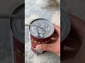 The process of quickly opening a metal can using a spoon