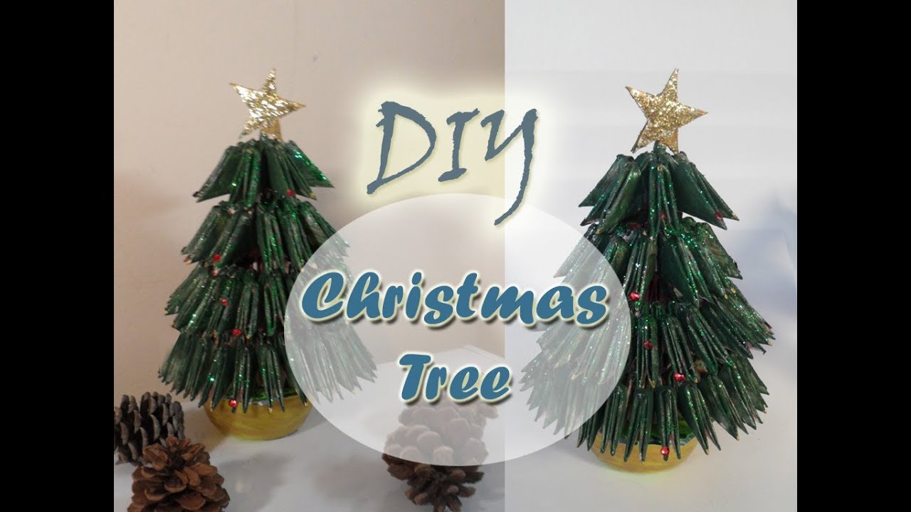 DIY How to make Christmas tree 3d ORIGAMI from paper طريقة عمل شجرة ...