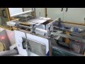 Automatic carton erector and sealer