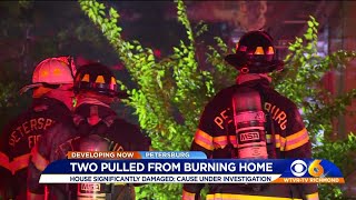 Firefighters rescue 2 from burning home in Petersburg