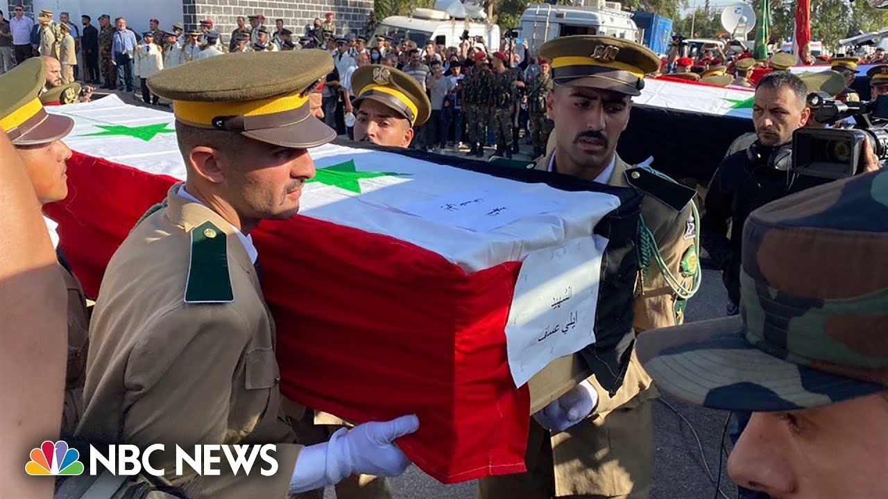 Syria mourns scores killed in drone attack on Homs military academy