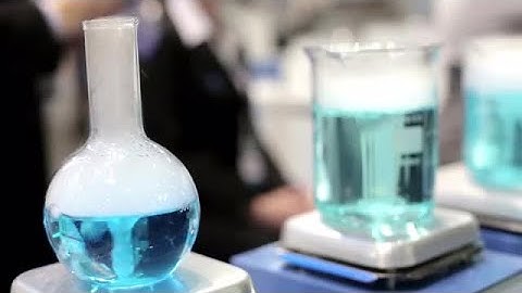 Test In Laboratory Flasks Stock Video