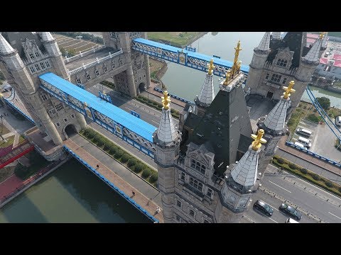 Video: Arhitectură eccentrică: Replica cu navetă spațială construită pe partea de sus a acoperișului chinezesc