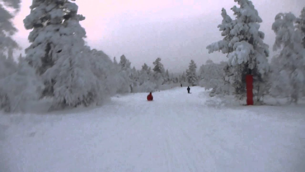 Emma Tobogganing in Lapland (Saariselkä in Finland