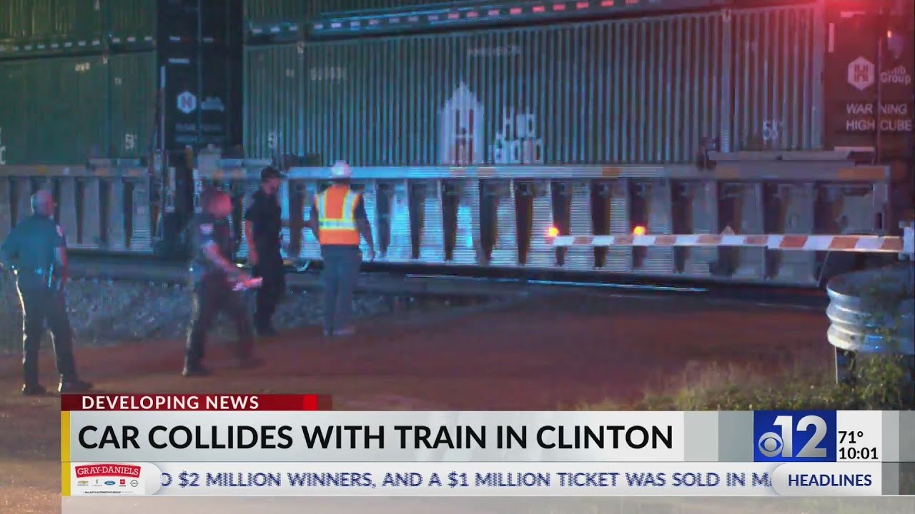 Two injured after car collides with train in Clinton - YouTube