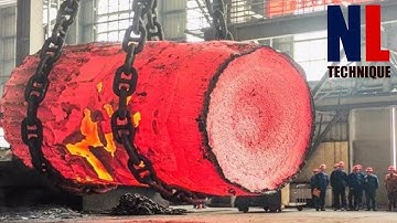 Cool And Creative Giant Block Of Metal Production Process With Modern Machines And Skillful Workers