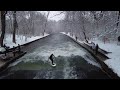 River Surfing in Munich || Surfing on the Eisbach(Isar) || A snowy day English Garden, Germany[4K]