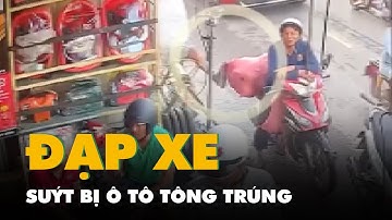 Clip người trong cửa hàng đạp ngã xe máy chở dừa khi ô tô đang chạy tới