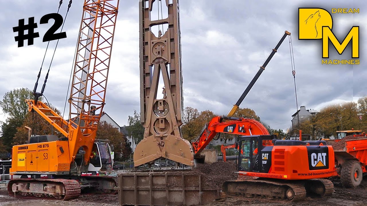 LIEBHERR HS 875 CATERPILLAR 323F BAGGER SCHLITZWANDGREIFER BAUSTELLE NEUBAU DREAM  MACHINES 