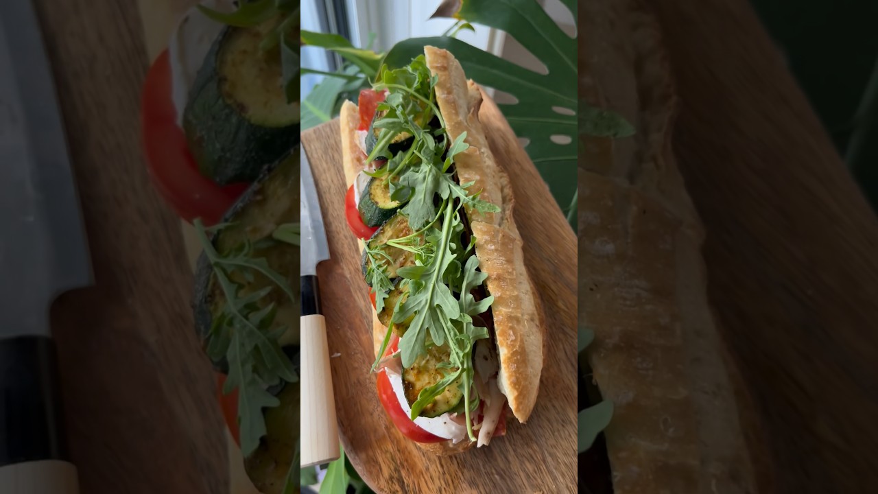 Eating a huge baguette sandwich for lunch