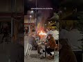 French diners eat calmly amid firey protest