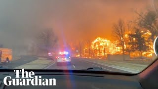 Wildfires sweep through Colorado destroying homes as tens of thousands evacuate