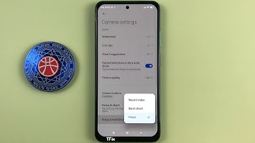 Press and hold the shutter key to record video, take continuous shots or focus in-camera on Xiaomi