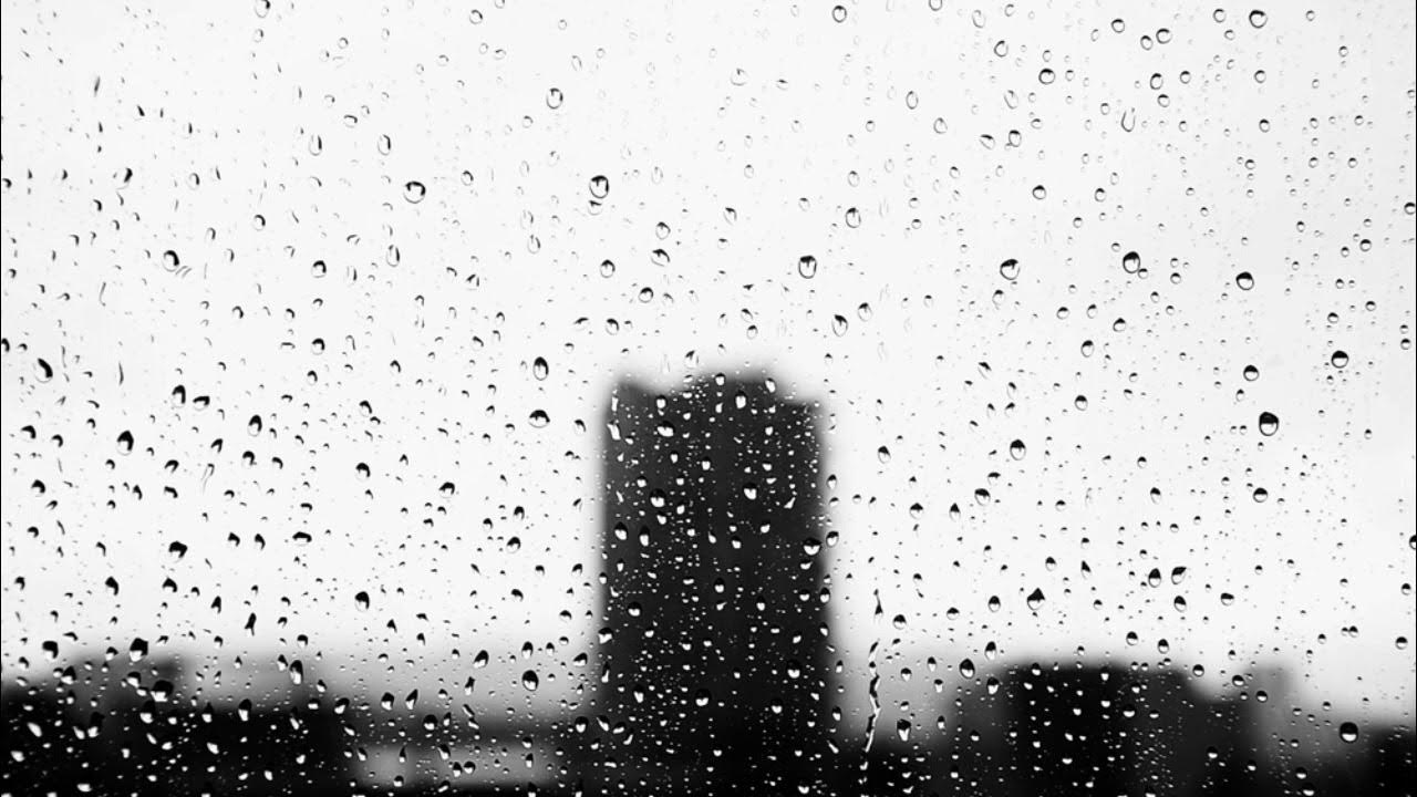 Фон медленный для слов. Капли на стекле. Дождь. Падающий дождь. Дождь за окном.