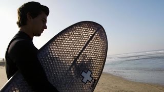 Riding Waves on a Cardboard Surfboard