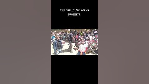 Protesters chain themselves together and chant anti-abduction slogans; Okiya Omtatah among them