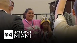 Child crash survivor reunites with those who helped save his life
