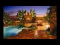 Decoración de jardines con piscina y chimenea
