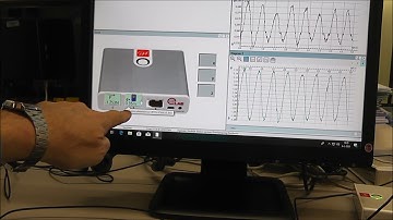 4vwo Kracht-  en afstandssensor met CMA Coach7 en CLAB bij cd met gewichtje aan een veer