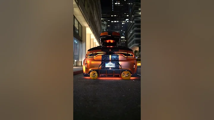 Motorist With Orange Car Fires Up Jack-O'-Lanterns