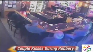 Couple continues to kiss through armed robbery