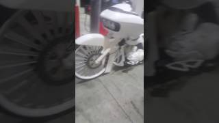 White Harley on 28" spins