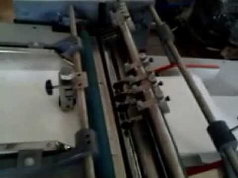 Video Máy cấn răng cưa hóa đơn tự động cuốn giấy - youtube