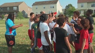 Pickerington youth football team practice with Ohio State Buckeyes after winning championship