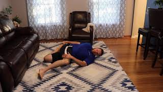 Brettzel Stretch. Sidelying hip 90 90 with thoracic rotation stretch