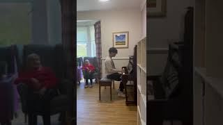 School pupil plays piano for residents at Rumbling Bridge