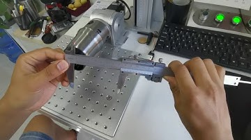 How do I use a fiber laser marking machine to mark a metal cup.  EZCAD rotating marking