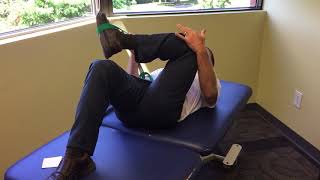 Supine cross leg stretch/Isometric strap