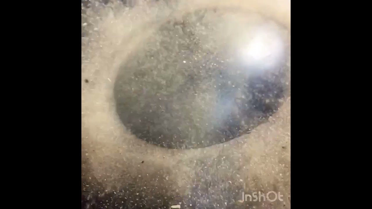 Dancing ashes of Palo Santo wood in progress of tuning handpan