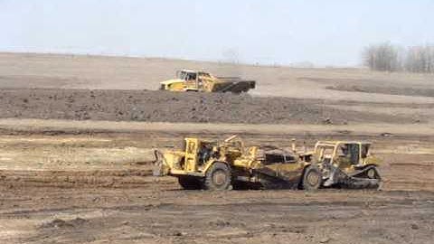 Twin engine 637 C Scraper and D8N Push Cat