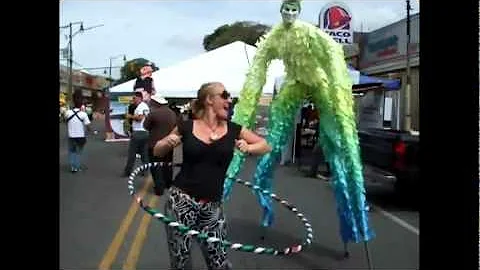 Stacey Rocks the Hoop with a Stilt Dancer