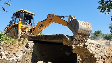 JCB 3DX SUPER ECOXCELLENCE Backhoe Loader Breaking Old Concrete Bridge - JCB Earth Movers Video.