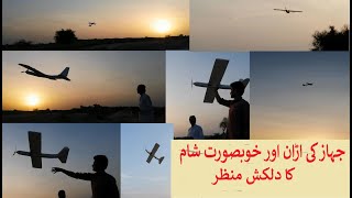 home made glider airplane&#39;s flight and beautiful view of evening