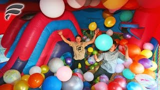 BOUNCE HOUSE SLIDE FILLED WITH 500 BALLOONS!